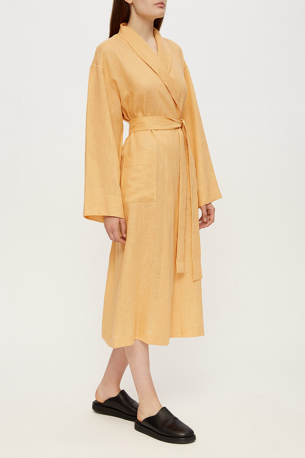 Female linen robe in ochre