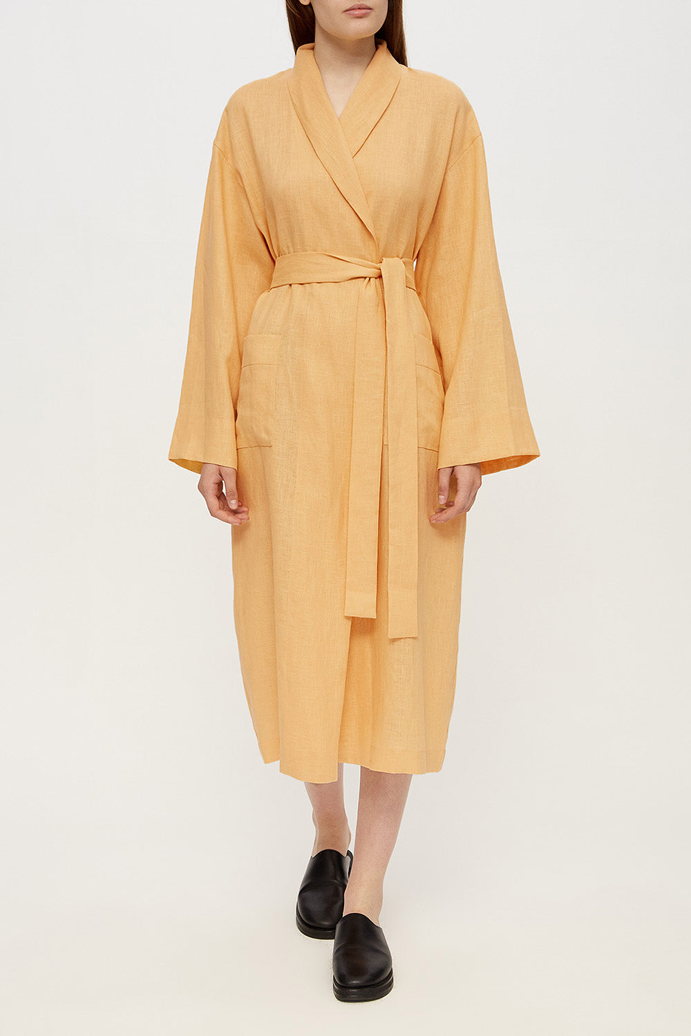 Female linen robe in ochre